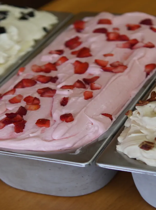 A fresh tub of strawberry ice cream